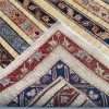 Tappeto Feheran con raffigurazioni di caccia e celebrazioni, esempio di arte tessile orientale