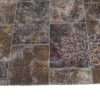 Tappeto patchwork ideale per soggiorni moderni con mix di texture e colori