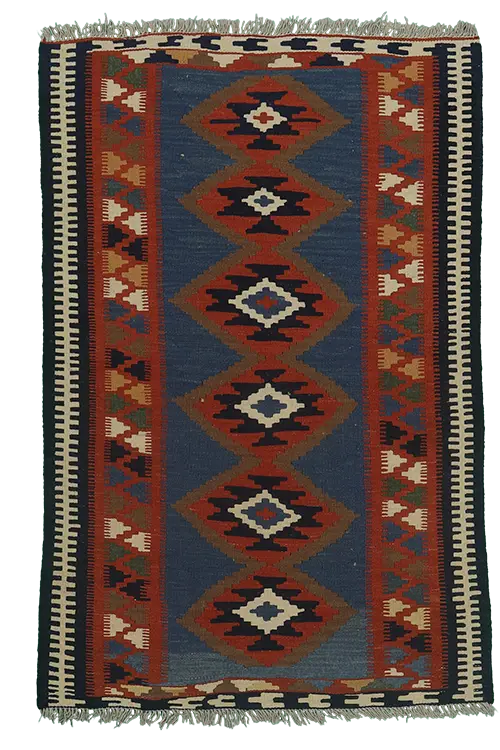 Tappeto Kilim dallo stile orientale, ideale per arredare soggiorni e ambienti accoglienti.