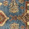 Tappeto Kazak con geometrie tradizionali e design senza tempo.