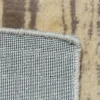Tappeto Decor Extra con disegno ornamentale e dettagli decorativi distribuiti sulla superficie.